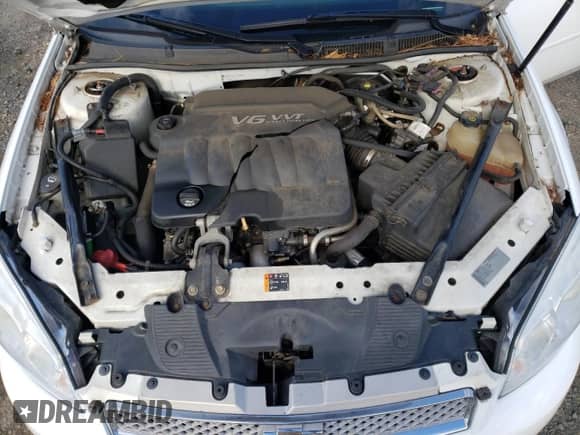 2012 Chevrolet Impala LT Retail with VIN 2G1WB5E32C1210959, listed as a Copart auction lot 89847055 with 76,493 mi miles and Salvage title. Bid and sale history available at DreamBid. Image 11.