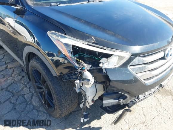 2014 Hyundai Santa Fe with VIN 5XYZUDLAXEG151453, listed as a IAAI auction lot 43479084 with 127,090 mi miles and . Bid and sale history available at DreamBid. Image 17.