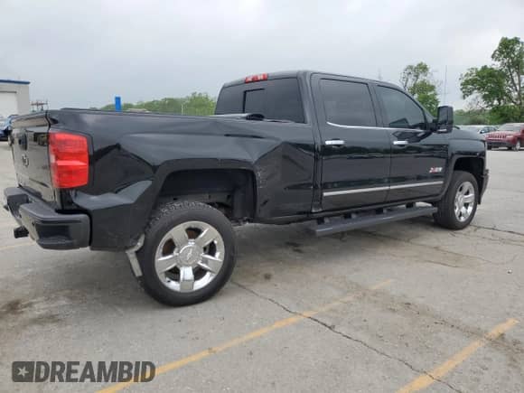 2015 Chevrolet Silverado 1500 LTZ z VIN 3GCUKSEJ2FG410800, wystawiony jako Copart lot #56052234 z przebiegiem 116 986 mil mil oraz Szkoda całkowita • Salvage title. Historia ofert i sprzedaży dostępna na DreamBid. Obrazek 3.