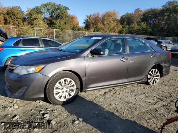 2014 Toyota Camry XLE z VIN 4T4BF1FK3ER350620, wystawiony jako Copart lot #87195205 z przebiegiem 84 279 mil mil oraz Szkoda całkowita • Salvage title. Historia ofert i sprzedaży dostępna na DreamBid. Obrazek 1.