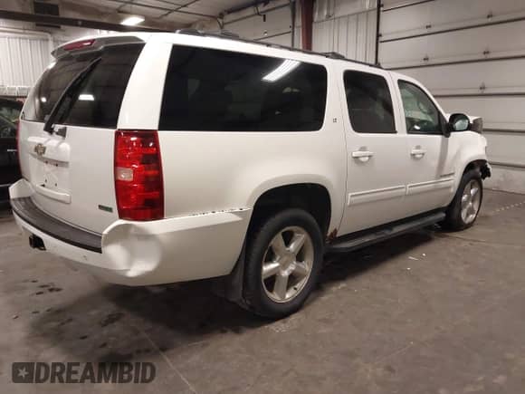2010 Chevrolet Suburban LT z VIN 1GNUKJE32AR272865, wystawiony jako IAAI lot #43260380 z przebiegiem 167 294 mil mil oraz . Historia ofert i sprzedaży dostępna na DreamBid. Obrazek 4.