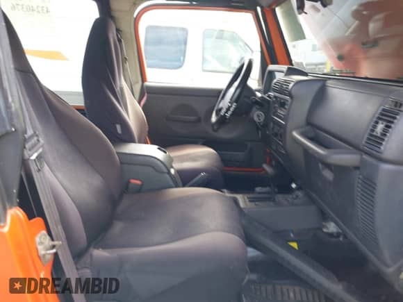 2002 Jeep Wrangler X z VIN 1J4FA39S22P731157, wystawiony jako IAAI lot #43240376 z przebiegiem 154 782 mil mil oraz . Historia ofert i sprzedaży dostępna na DreamBid. Obrazek 5.