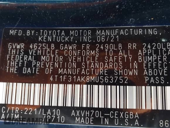 2021 Toyota Camry Hybrid XLE with VIN 4T1F31AK8MU563752, listed as a IAAI auction lot 42134620 with 19,484 mi miles and . Bid and sale history available at DreamBid. Image 9.