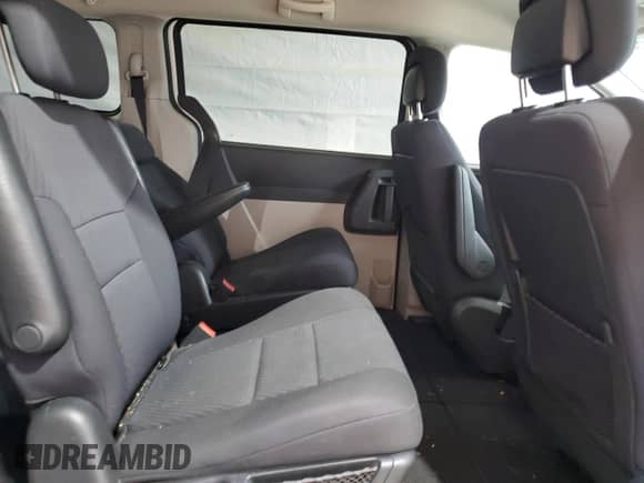 2010 Dodge Grand Caravan SXT z VIN 2D4RN5D17AR499253, wystawiony jako Copart lot #69954035 z przebiegiem 153 984 mil mil oraz Szkoda całkowita • Salvage title. Historia ofert i sprzedaży dostępna na DreamBid. Obrazek 11.