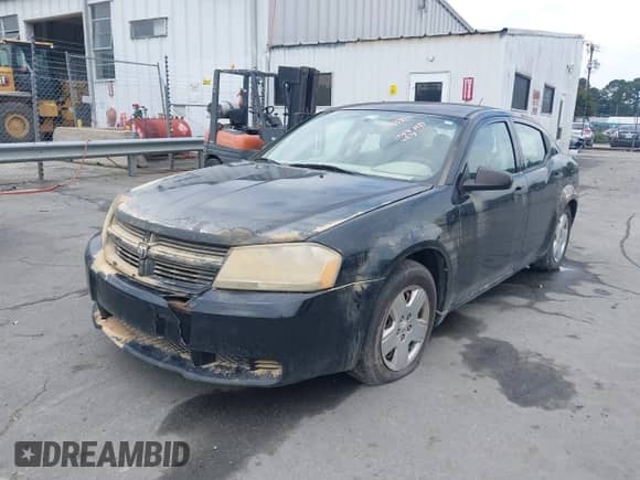 2010 Dodge Avenger SXT with VIN 1B3CC4FB2AN206110, listed as a IAAI auction lot 42915713 with 314,601 mi miles and . Bid and sale history available at DreamBid. Image 2.