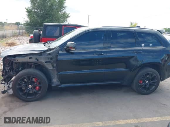 2016 Jeep Grand Cherokee SRT with VIN 1C4RJFDJ7GC399461, listed as a IAAI auction lot 43320500 with 97,123 mi miles and . Bid and sale history available at DreamBid. Image 15.