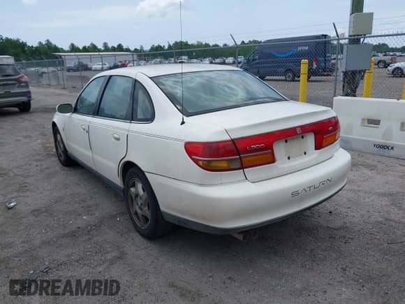 2002 Saturn LS with VIN 1G8JW54R82Y577897, listed as a IAAI auction lot 42577003 with 173,626 mi miles and . Bid and sale history available at DreamBid. Image 3.