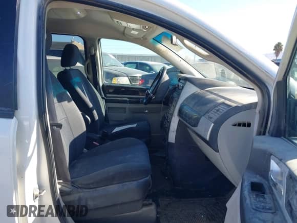 2010 Dodge Grand Caravan SXT with VIN 2D4RN5D1XAR131178, listed as a IAAI auction lot 43390738 with 171,404 mi miles and . Bid and sale history available at DreamBid. Image 5.