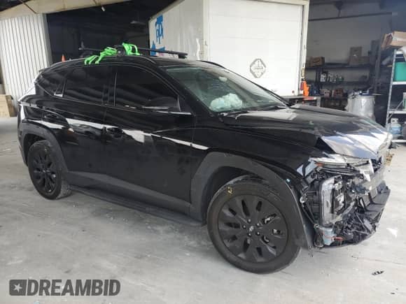 2023 Hyundai Tucson XRT with VIN KM8JFCAE0PU219909, listed as a Copart auction lot 62232115 with 50,187 mi miles and Salvage title. Bid and sale history available at DreamBid. Image 4.