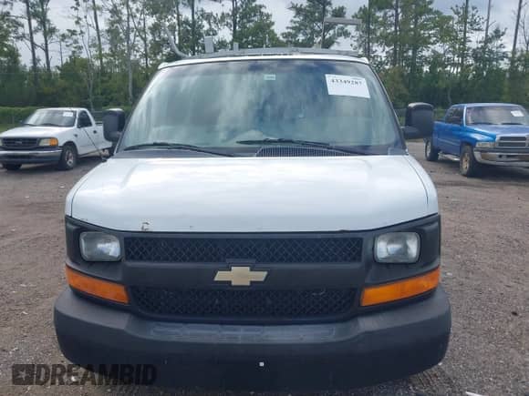 2013 Chevrolet Express Cargo with VIN 1GCWGFCA2D1158787, listed as a IAAI auction lot 43349287 with 189,483 mi miles and . Bid and sale history available at DreamBid. Image 6.