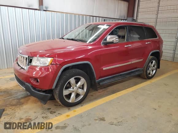 2011 Jeep Grand Cherokee Overland with VIN 1J4RR6GT6BC551724, listed as a Copart auction lot 81704965 with 98,696 mi miles and Salvage title. Bid and sale history available at DreamBid. Image 1.