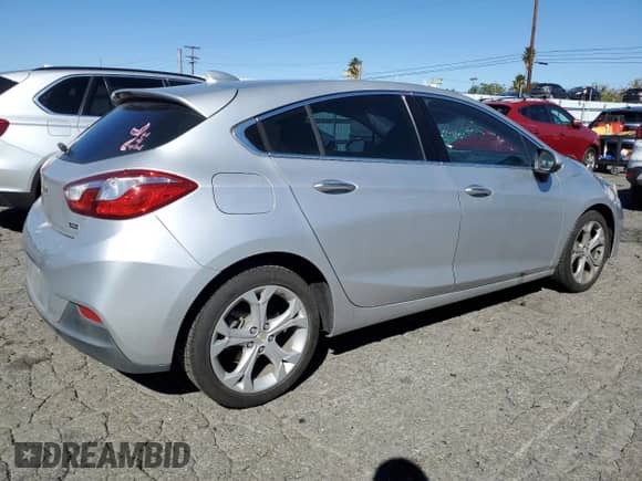2018 Chevrolet Cruze Premier с VIN 3G1BF6SM3JS615011, выставлен на аукционе Copart как лот 86972635 с пробегом 115 684 миль миль и Списание • Salvage title. История ставок и продаж доступна на DreamBid. Изображение 3.
