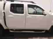 2014 Nissan Frontier SV z VIN 1N6AD0EV8EN731568, wystawiony jako IAAI lot #40983372 z przebiegiem Nie podano mil oraz . Historia ofert i sprzedaży dostępna na DreamBid. Obrazek 13.