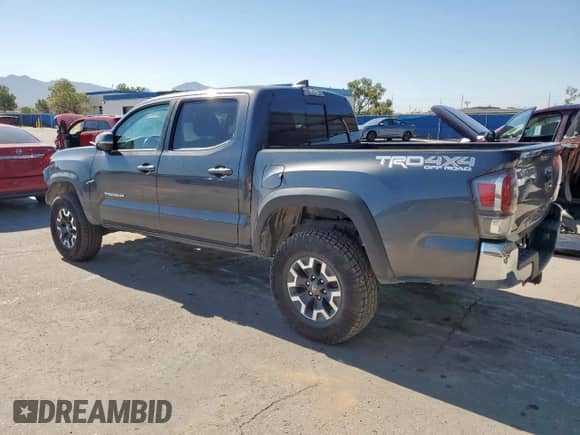 2022 Toyota Tacoma SR z VIN 3TMCZ5AN9NM497774, wystawiony jako Copart lot #67623515 z przebiegiem 81 112 mil mil oraz Szkoda całkowita • Salvage title. Historia ofert i sprzedaży dostępna na DreamBid. Obrazek 2.