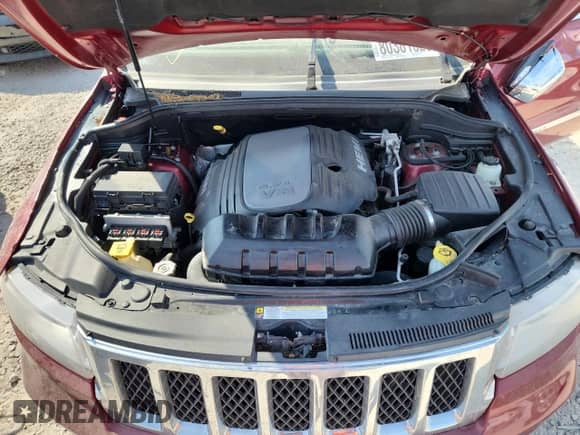 2012 Jeep Grand Cherokee Overland с VIN 1C4RJFCT4CC112879, выставлен на аукционе Copart как лот 80381625 с пробегом Не указан миль и Списание • Salvage title. История ставок и продаж доступна на DreamBid. Изображение 12.