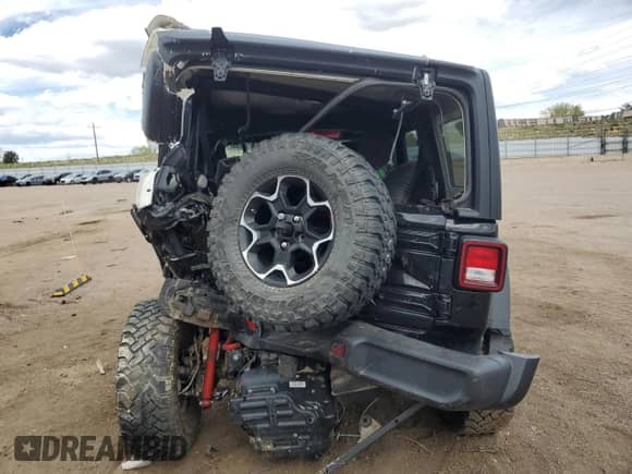 2023 Jeep Wrangler Rubicon with VIN 1C4JJXFM8PW607551, listed as a Copart auction lot 49731885 with 20,227 mi miles and Salvage title. Bid and sale history available at DreamBid. Image 6.