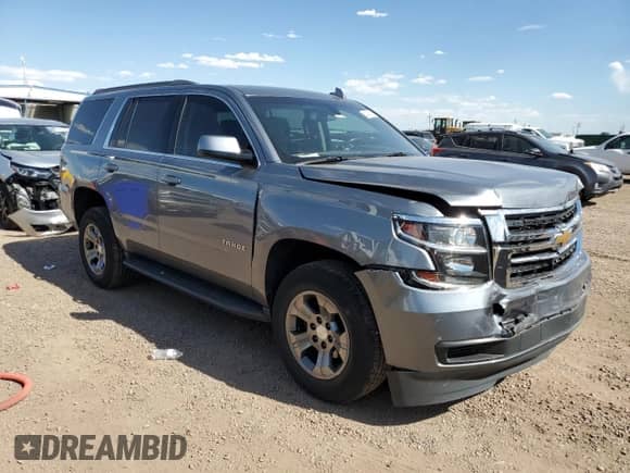 2019 Chevrolet Tahoe LS with VIN 1GNSCAKC8KR398173, listed as a Copart auction lot 64331585 with 52,519 mi miles and Salvage title. Bid and sale history available at DreamBid. Image 4.