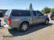 2006 Nissan Frontier SE z VIN 1N6AD06W66C403523, wystawiony jako Copart lot #65054395 z przebiegiem 151 766 mil mil oraz Szkoda całkowita • Salvage title. Historia ofert i sprzedaży dostępna na DreamBid. Obrazek 3.