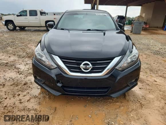 2016 Nissan Altima SR with VIN 1N4AL3AP9GC194745, listed as a Copart auction lot 82051095 with 57,656 mi miles and Salvage title. Bid and sale history available at DreamBid. Image 5.