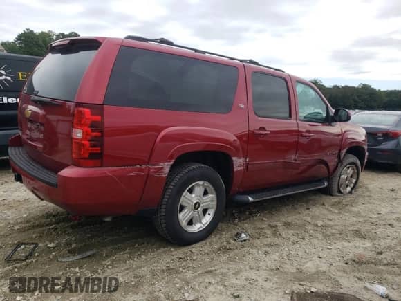 2013 Chevrolet Suburban LT с VIN 1GNSKJE75DR338100, выставлен на аукционе Copart как лот 71713385 с пробегом 71 442 миль миль и Списание • Salvage title. История ставок и продаж доступна на DreamBid. Изображение 3.