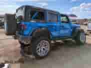 2021 Jeep Wrangler Unlimited Sport Altitude with VIN 1C4HJXDNXMW715577, listed as a Copart auction lot 61032615 with 91,517 mi miles and Salvage title. Bid and sale history available at DreamBid. Image 3.