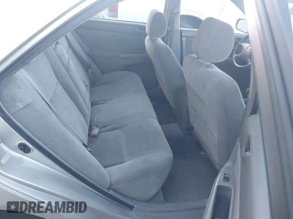 2003 Toyota Camry LE with VIN JTDBE32K130187036, listed as a IAAI auction lot 43504391 with 205,170 mi miles and . Bid and sale history available at DreamBid. Image 8.