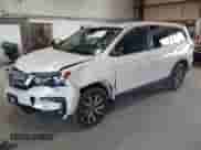 2022 Honda Pilot EX-L with VIN 5FNYF6H53NB081766, listed as a IAAI auction lot 42615459 with 39,878 mi miles and . Bid and sale history available at DreamBid. Image 2.