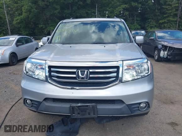 2014 Honda Pilot EX-L with VIN 5FNYF4H53EB001242, listed as a IAAI auction lot 43091314 with 175,745 mi miles and . Bid and sale history available at DreamBid. Image 12.