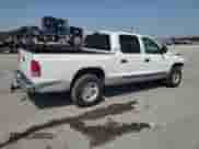 2000 Dodge Dakota Sport with VIN 1B7GL2ANXYS682705, listed as a Copart auction lot 80327865 with 219,406 mi miles and Salvage title. Bid and sale history available at DreamBid. Image 3.