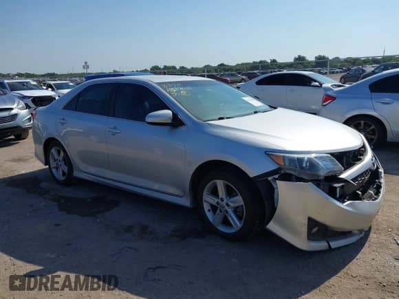 2014 Toyota Camry L with VIN 4T1BF1FK5EU373973, listed as a IAAI auction lot 43008960 with 184,232 mi miles and . Bid and sale history available at DreamBid. Image 1.