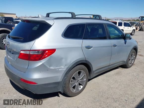 2016 Hyundai Santa Fe SE with VIN KM8SM4HF4GU154304, listed as a IAAI auction lot 43397984 with 239,833 mi miles and . Bid and sale history available at DreamBid. Image 4.