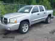 2007 Dodge Dakota SLT with VIN 1D7HE48K27S127788, listed as a IAAI auction lot 42311626 with 357,130 mi miles and . Bid and sale history available at DreamBid. Image 2.