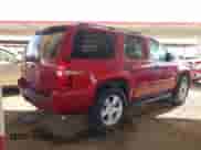 2007 Chevrolet Tahoe LT with VIN 1GNFC13J07R225074, listed as a IAAI auction lot 43396432 with 214,881 mi miles and . Bid and sale history available at DreamBid. Image 4.