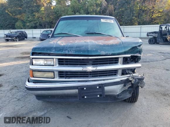 1997 Chevrolet Suburban z VIN 3GNEC16R6VG167319, wystawiony jako Copart lot #77485194 z przebiegiem 188 479 mil mil oraz Szkoda całkowita • Salvage title. Historia ofert i sprzedaży dostępna na DreamBid. Obrazek 5.