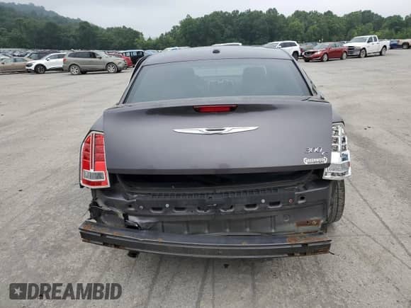 2014 Chrysler 300 C с VIN 2C3CCAET3EH200343, выставлен на аукционе Copart как лот 64283935 с пробегом 139 106 миль миль и Списание • Salvage title. История ставок и продаж доступна на DreamBid. Изображение 6.