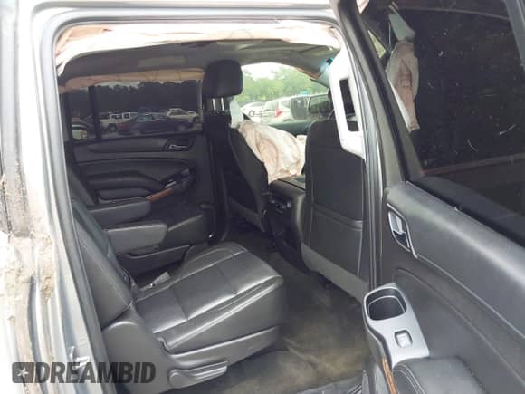 2017 Chevrolet Suburban Premier with VIN 1GNSCJKC7HR271486, listed as a IAAI auction lot 42480343 with 161,133 mi miles and . Bid and sale history available at DreamBid. Image 8.