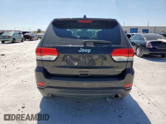 2018 Jeep Grand Cherokee Laredo z VIN 1C4RJEAG2JC480930, wystawiony jako Copart lot #65184965 z przebiegiem 70 700 mil mil oraz Szkoda całkowita • Salvage title. Historia ofert i sprzedaży dostępna na DreamBid. Obrazek 6.