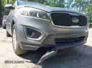 2018 Kia Sorento LX with VIN 5XYPG4A53JG394391, listed as a IAAI auction lot 42391459 with 119,046 mi miles and . Bid and sale history available at DreamBid. Image 6.