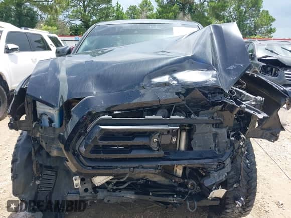 2022 Toyota Tacoma TRD Off Road with VIN 3TMCZ5ANXNM520138, listed as a IAAI auction lot 42713936 with 67,002 mi miles and . Bid and sale history available at DreamBid. Image 13.