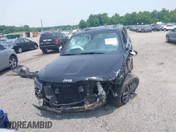 2021 Jeep Grand Cherokee Limited with VIN 1C4RJFBGXMC590777, listed as a IAAI auction lot 42416765 with 71,493 mi miles and . Bid and sale history available at DreamBid. Image 12.