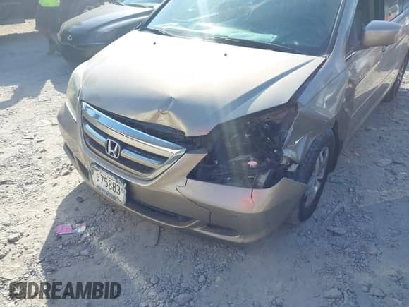 2007 Honda Odyssey EX z VIN 5FNRL38437B074662, wystawiony jako IAAI lot #40716076 z przebiegiem 228 344 mil mil oraz . Historia ofert i sprzedaży dostępna na DreamBid. Obrazek 6.