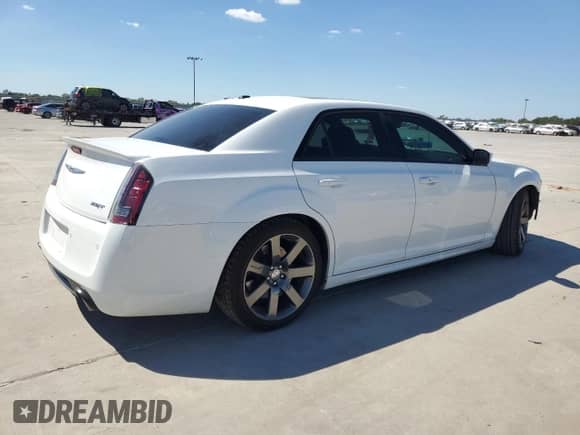 2014 Chrysler 300 SRT-8 с VIN 2C3CCAFJ5EH230747, выставлен на аукционе Copart как лот 73540564 с пробегом 29 458 миль миль и Списание • Salvage title. История ставок и продаж доступна на DreamBid. Изображение 3.