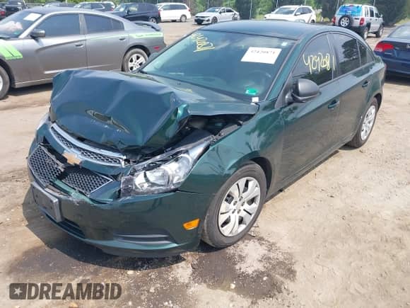 2014 Chevrolet Cruze LS with VIN 1G1PA5SH2E7451241, listed as a IAAI auction lot 42420871 with 100,538 mi miles and . Bid and sale history available at DreamBid. Image 2.