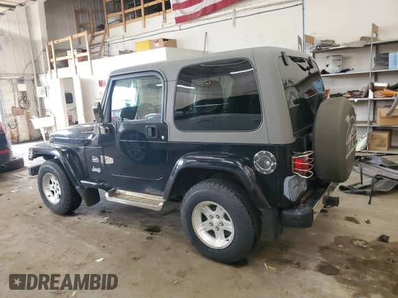 2004 Jeep Wrangler Sahara с VIN 1J4FA59S54P731734, выставлен на аукционе Copart как лот 64722285 с пробегом 184 006 миль миль и Чистый • Clean title. История ставок и продаж доступна на DreamBid. Изображение 2.
