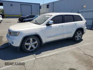 2012 Jeep Grand Cherokee Overland z VIN 1C4RJECT9CC126495, wystawiony jako Copart lot #71229825 z przebiegiem 182 398 mil mil oraz Czysty tytuł • Clean title. Historia ofert i sprzedaży dostępna na DreamBid. Obrazek 1.