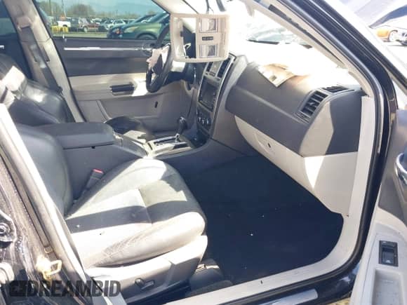 2006 Chrysler 300 C SRT-8 with VIN 2C3LA73W36H509656, listed as a IAAI auction lot 41852179 with 92,209 mi miles and . Bid and sale history available at DreamBid. Image 5.