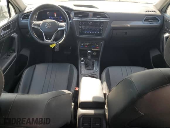 2023 Volkswagen Tiguan SE with VIN 3VV3B7AXXPM018686, listed as a Copart auction lot 70002295 with 69,726 mi miles and Salvage title. Bid and sale history available at DreamBid. Image 8.