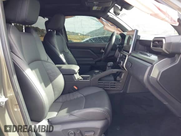 2024 Toyota Tacoma SR5 with VIN 3TMLB5JN6RM027745, listed as a IAAI auction lot 41479793 with 16,376 mi miles and . Bid and sale history available at DreamBid. Image 5.