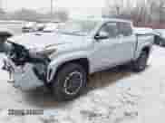 2024 Toyota Tacoma SR5 with VIN 3TMLB5JN6RM018639, listed as a IAAI auction lot 41251861 with 10,088 mi miles and . Bid and sale history available at DreamBid. Image 2.