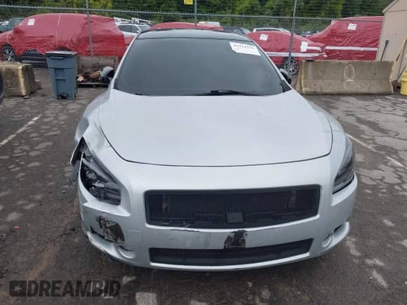 2014 Nissan Maxima S z VIN 1N4AA5AP3EC495087, wystawiony jako IAAI lot #43122516 z przebiegiem 122 886 mil mil oraz . Historia ofert i sprzedaży dostępna na DreamBid. Obrazek 12.